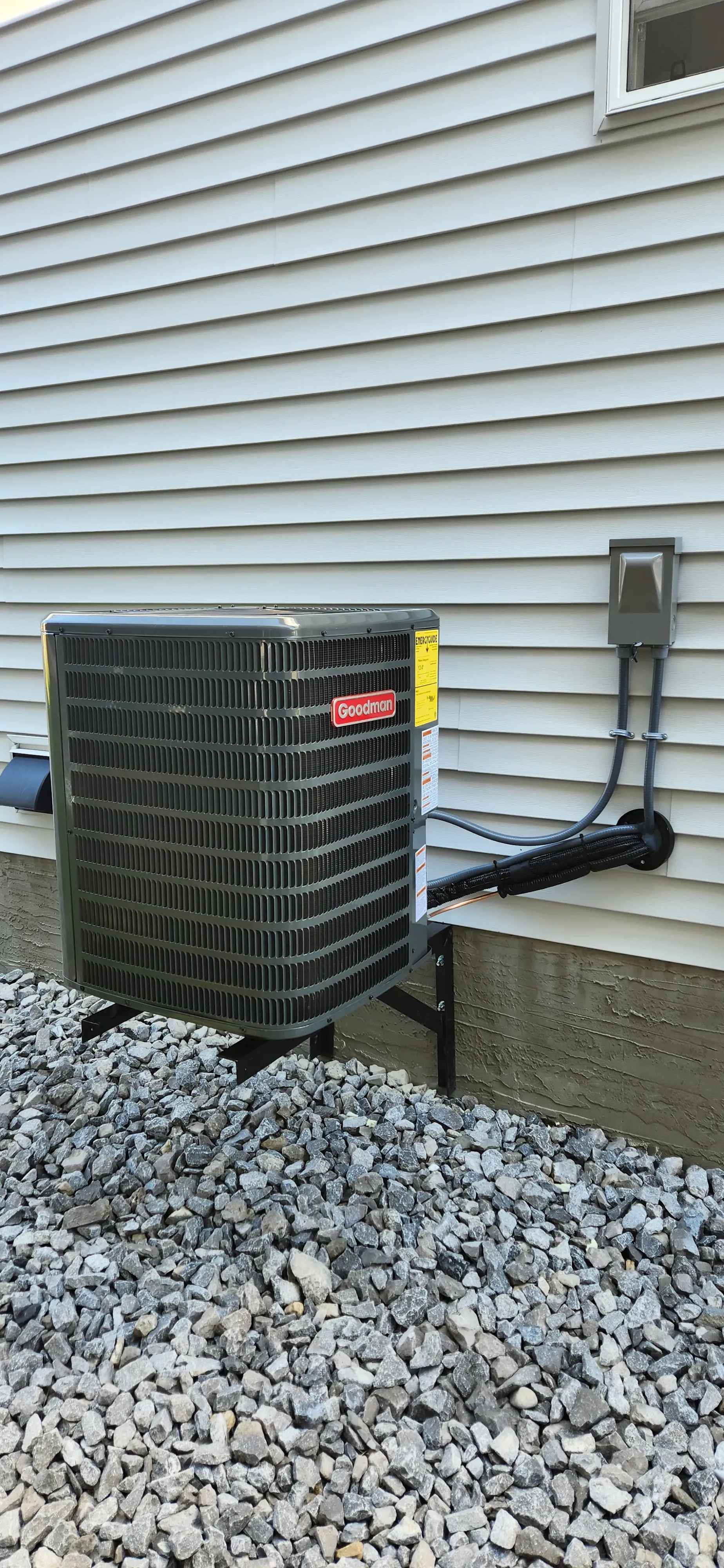 New central air conditioner installed on an Alberta home